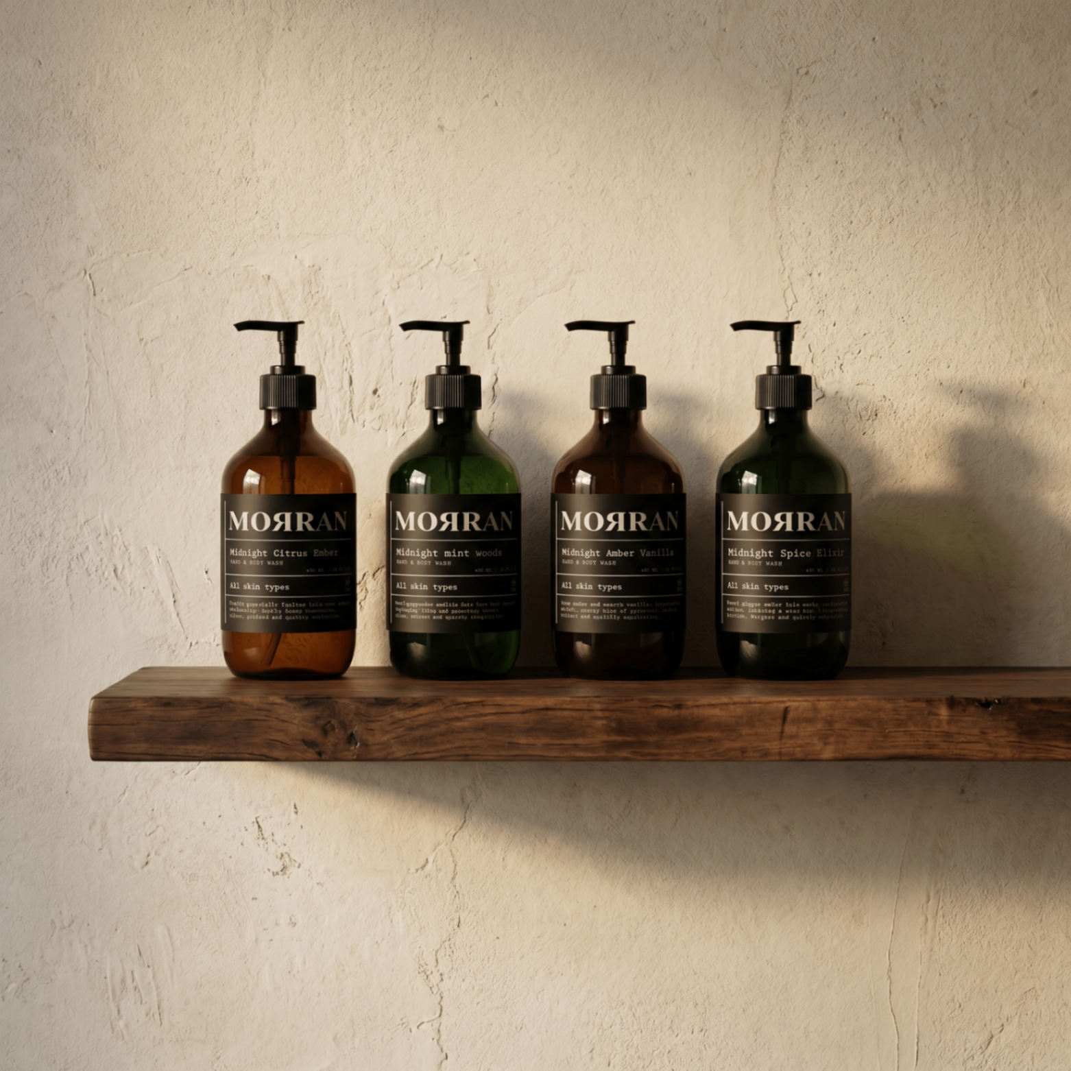Four Morran body wash bottles on a wooden shelf against a textured plaster wall.